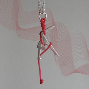 Dije Tela Acrobática